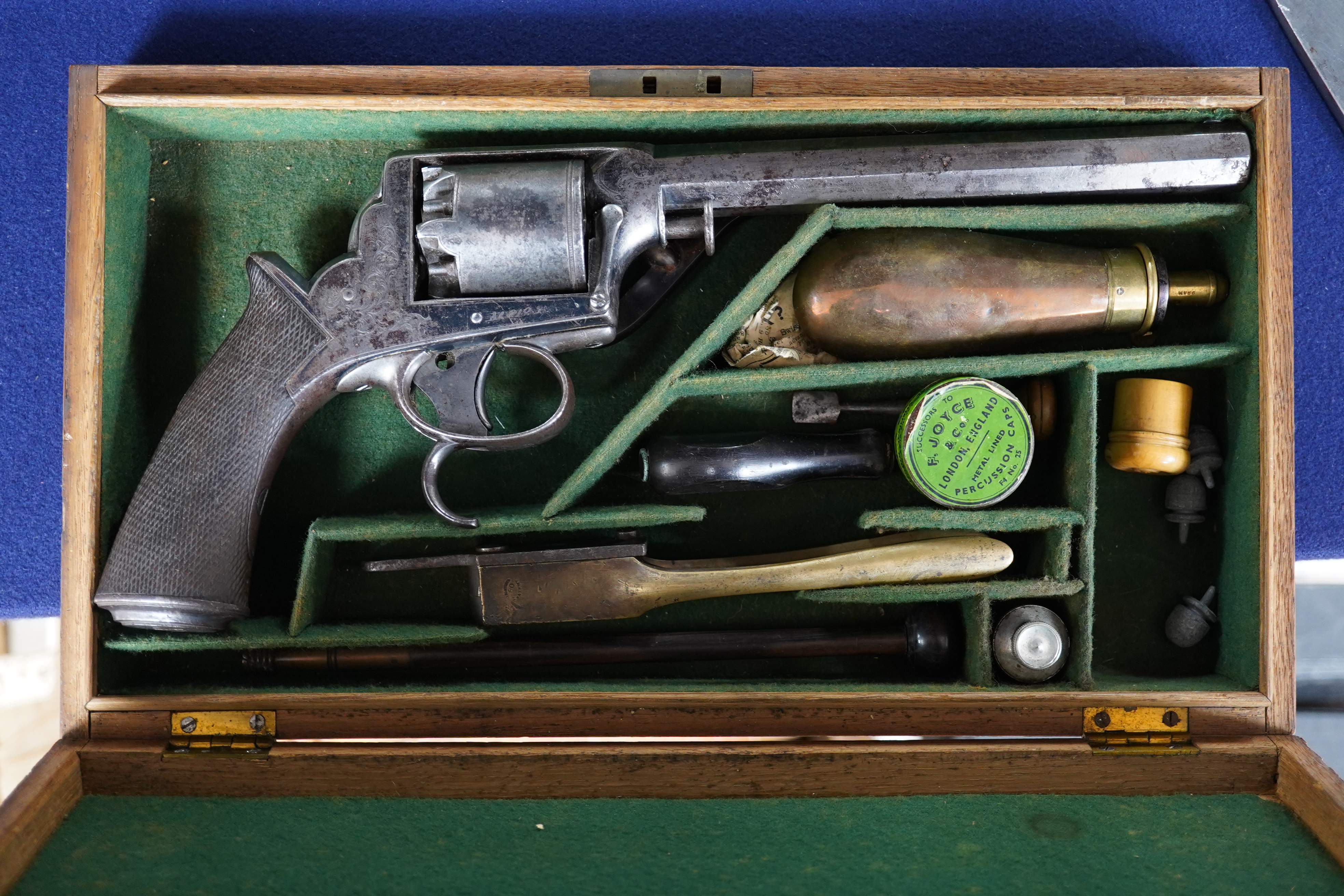 A scarce 36 bore 5 shot Tranter’s patent double trigger Dragoon percussion revolver retailed by T. Blissett, South Castle Street, Liverpool, number 2123, side lever detachable ramrod (replaced), foliate engraved frame, o